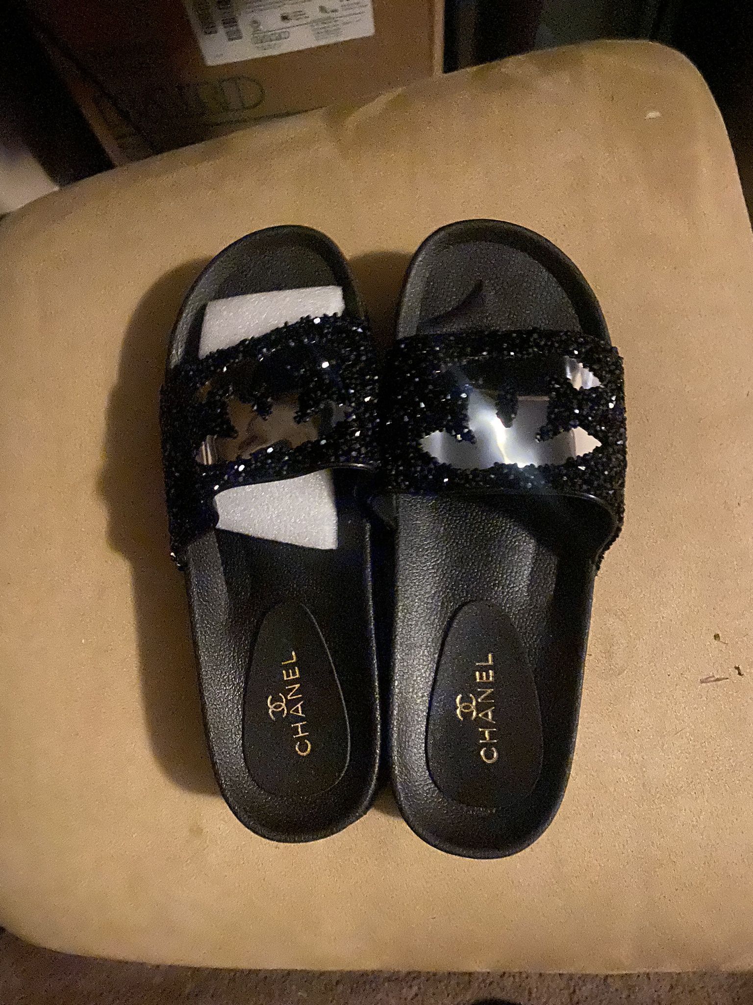 CC Slides, wallet and shades.