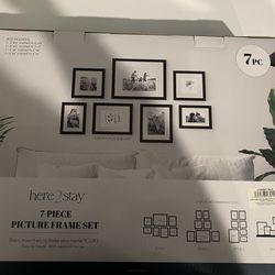 Brand new in box, picture frames 7 piece set.