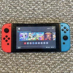 ‼️Nintendo Switch + 5 Games ‼️