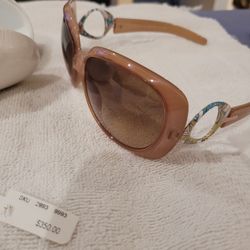 Emilio Pucci 620S sunglasses in color 264, featuring a dark beige frame and a distinctive colorful temple design