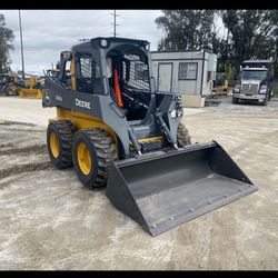 John Deere 320G Skid Steer