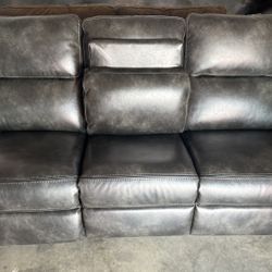 Like New Gray Leather Magellan Dual Power Recliner Sofa 