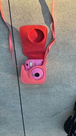 Instax camera with shoulder strap