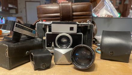 Vintage Polaroid Land Camera with Accessories