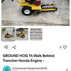Honda trencher  groundhog used.