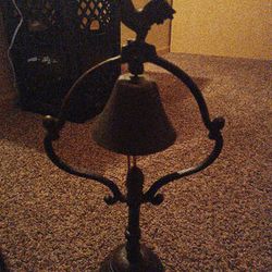 Cast iron rooster bell.