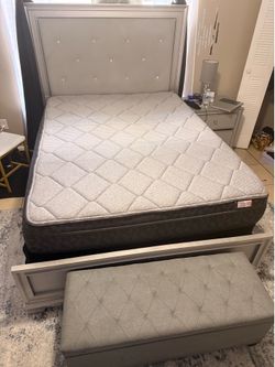 Queen size bed with light and mattress also with storage ottoman