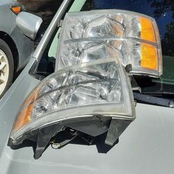 O.E.M:  07-13 Chevy Silverado Headlights O..E.M: 07-13 Chevy Silverado  Headlights