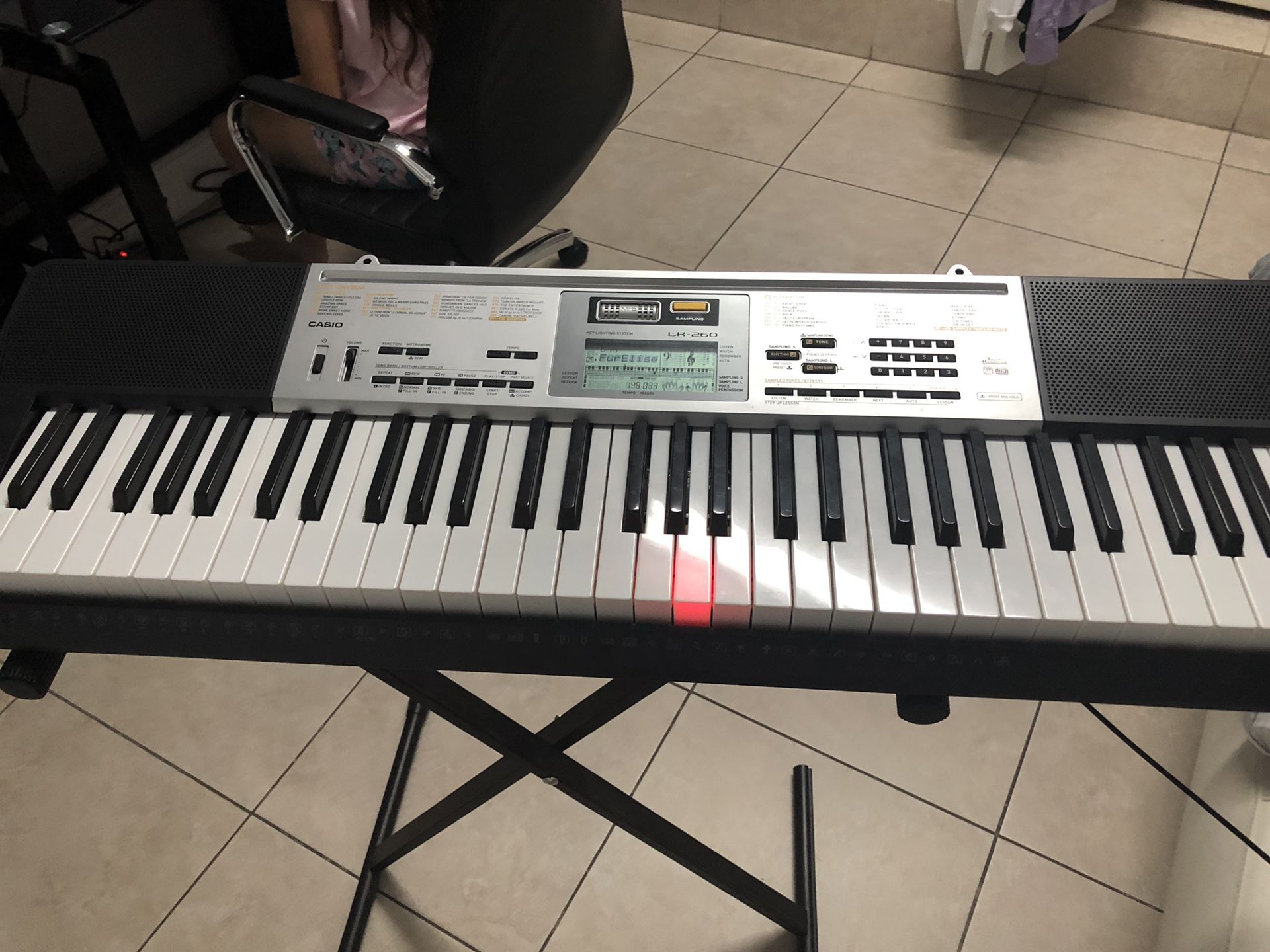 Casio Electronic Musical Instrument. LK-260 61 Lighted-Key Portable Arranger Keyboard