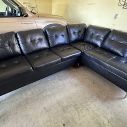 Black leather L Shape Couch 