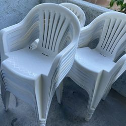 20 white plastic Chairs 