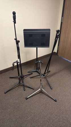 Mic stands and 1 guitar stand, book stand for music
