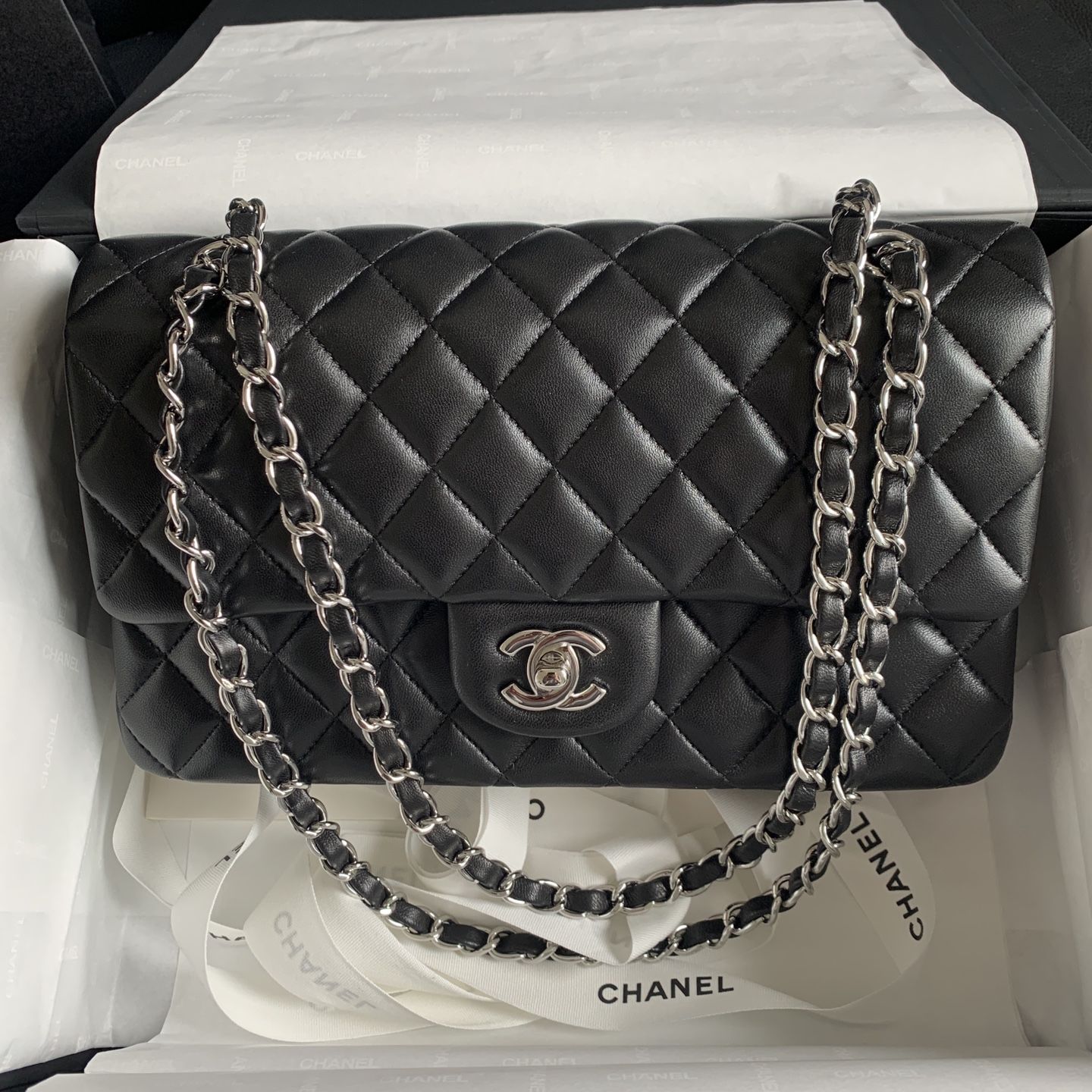 black and white chanel logo earrings