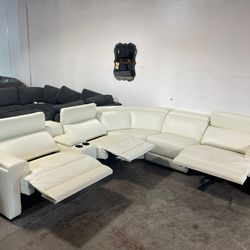 Leather Power Reclining Sectional with Power Headrests. BRAND NEW! 