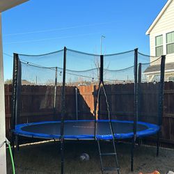 Trampoline And Swing Set