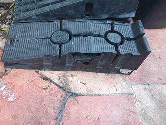 RhinoGear RhinoRamps, constructed from a durable polymer resin designed for vehicle maintenance. Weight Capacity: They typically support a gross vehic