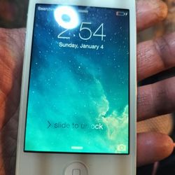 Older Apple I-Iphone(  Verizon)+ Cable 