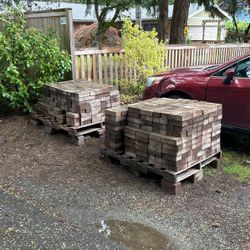 3 Large Pallets Of Red Cement Bricks