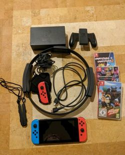 Nintendo Switch Console bundle including 3 games and Ring Fit
accessories