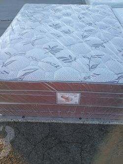 Brand new king size pillowtop mattress and box spring free delivery depends on location