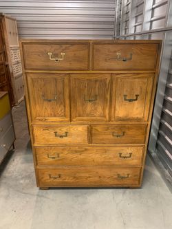 Vintage solid wood high boy campaign style