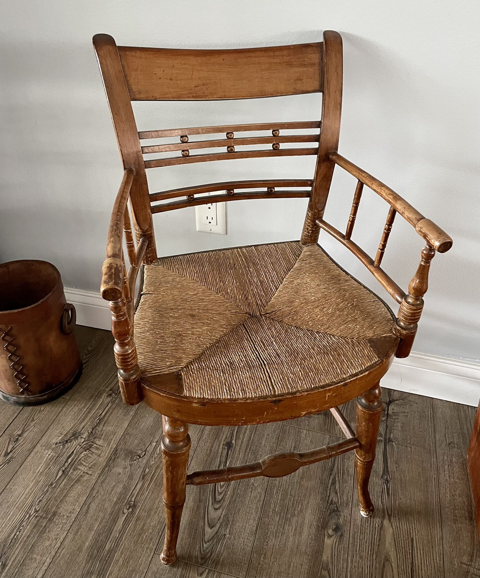 Wooden Antique chair with caned seat. Nice detail
