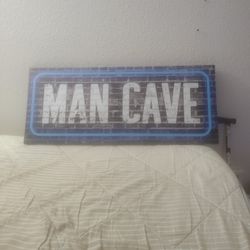 MAN CAVE POSTER