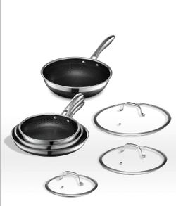 HexClad Hybrid Nonstick 7-Piece Cookware Set, 8", 10", and 12" Pans with Lids, and 10" Wok, Stay-Cool Handles, Dishwasher and Oven-Safe, Induction Rea