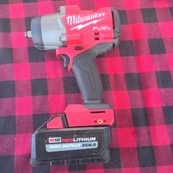 Milwaukee Fuel Impact Torque . With Battery Xc6.0 