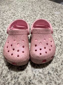 Pink crocs