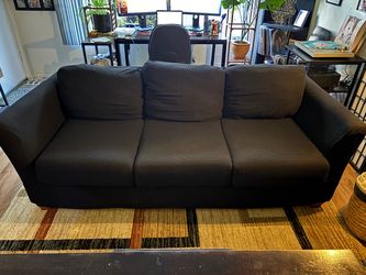 Three-seater orange fabric sofa