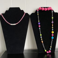 2 Pink Necklaces And One Pink Bracelet