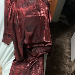 Copper pantsuit with short sleeve top and a perfect jacket size 12 run small and there’s it’s a three-piece set