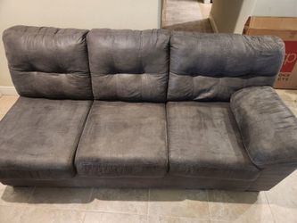 Gray sectional, ottoman, and recliner set
