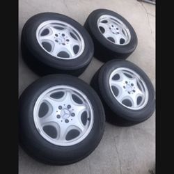 4 —- 225/60r16 5x112 5x4.41 Stock Mercedes S420 Rims Wheels With Tires 80% Treads !!