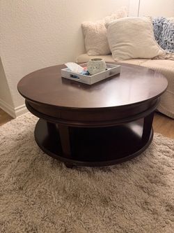 Round wood coffee table