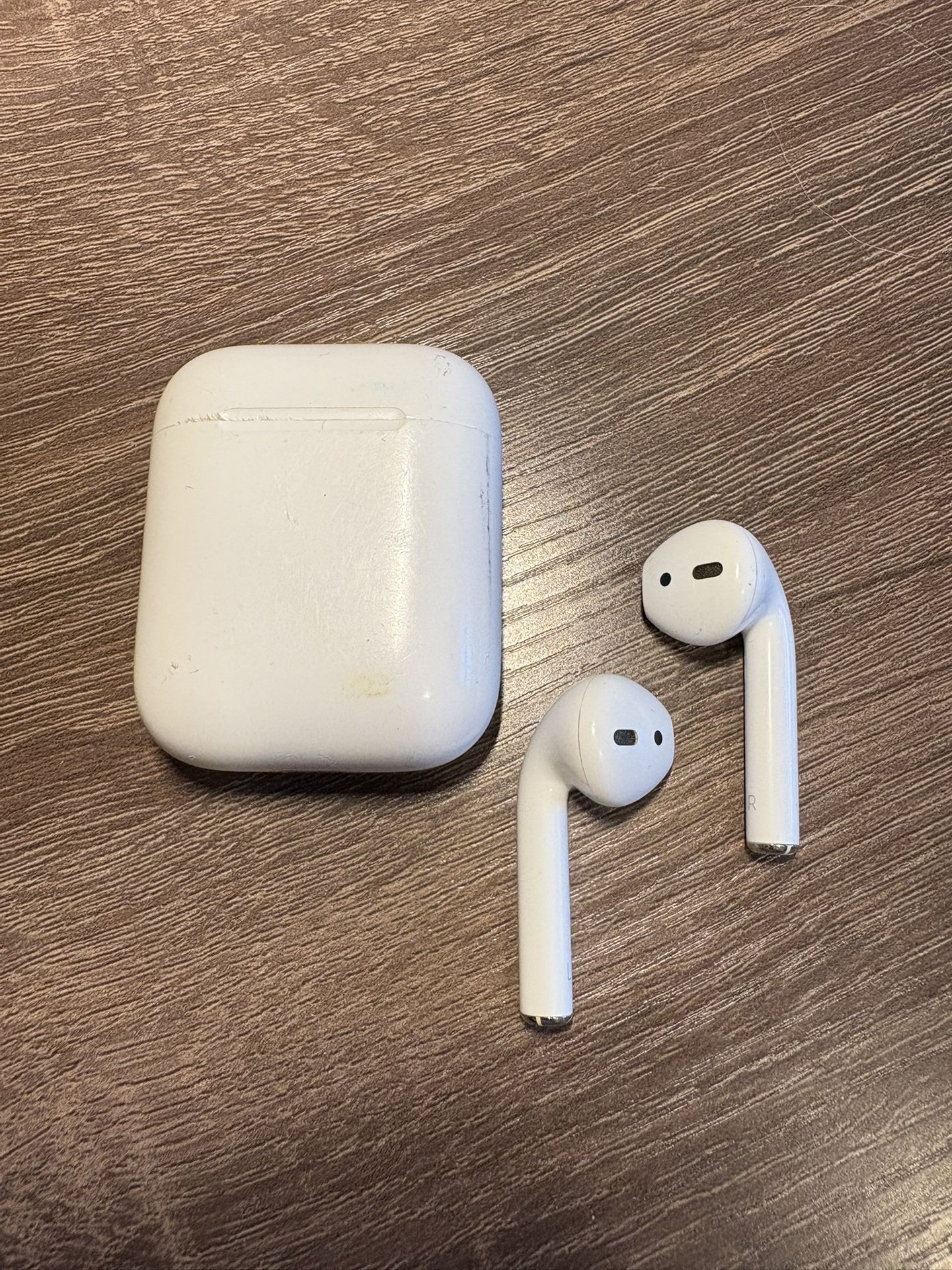 Apple AirPods 1st Gen – Charging Case Included
