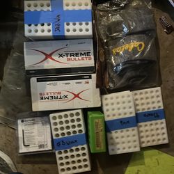 Reloading and misc marksman accessories brass casings and lots of random parts