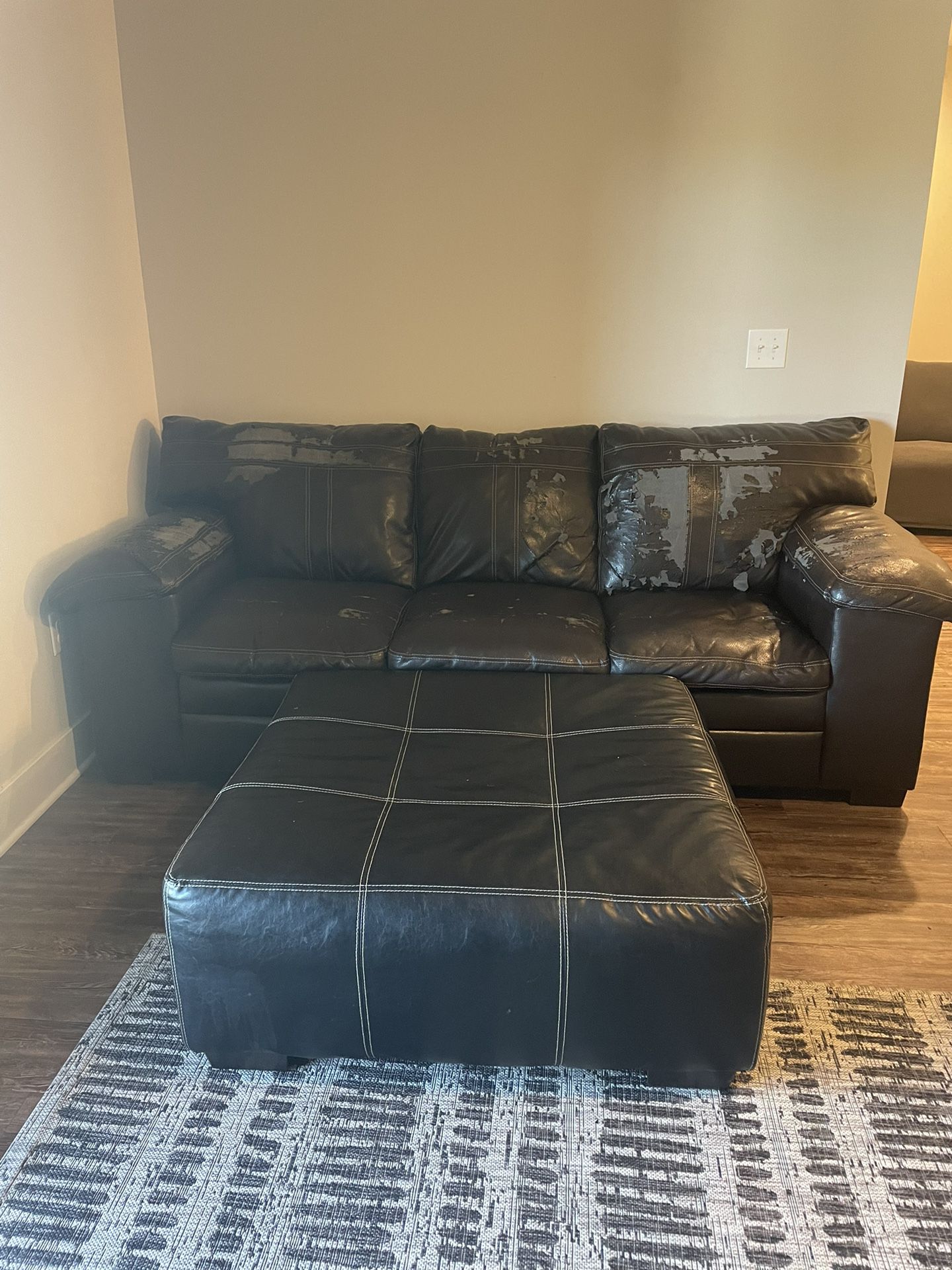 2 Leather Couches + Matching Ottoman