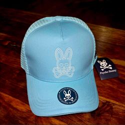 Psycho Bunny Unisex Trucker Style Snapback Hat.