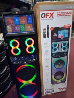 Tall and tower touch screen Bluetooth karaoke 🎤 party speaker 🔊 by QFX.  Free 🎤.  Brand new