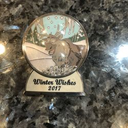 Collectible Disney Christmas Winter Wishes Snow Globe 2017 Pin.  Featuring Sven from Frozen.  Size 1 1/2 inches long and 1 1/4 inches wide.  LE