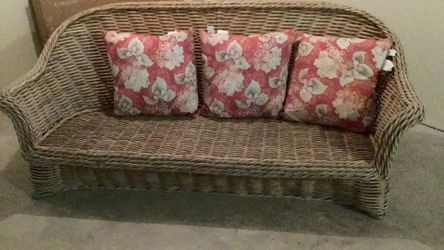 Wicker Sofa with throw pillows