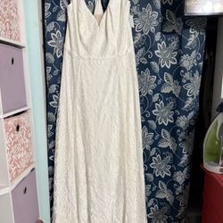 Wedding gown with veil and headpiece