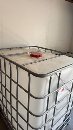 275-gallon Intermediate Bulk Container (IBC) tank typically used for storing liquids