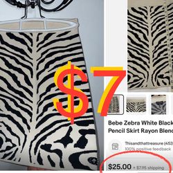 $7 like new Bebe Pencil Skirt size XS in mint condition stretching Fabric