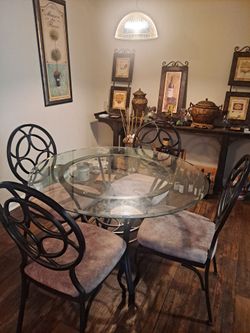 Medium size dining table with four chairs ..