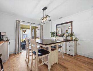 Counter height, dining, set with four chairs and a bench