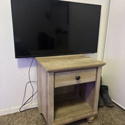 43’ Tv And Wooden Shelf 
