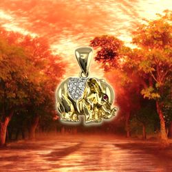 14kt 5.50g Yellow Gold with Small CZ’s/Small Red Stones Elephant Pendant.